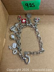 MaxSold Auction: Sterling Silver Jewelry and Charms with Brooches and Necklace - Addington Highlands (Ontario, Canada) PARTNER MANAGED Downsizing Online Auction - Highway 41