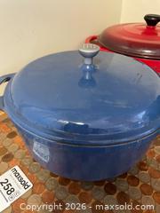 MaxSold Auction: Two Enameled Cast Iron Dutch Ovens Blue and Red with Pyrex Booklet - Addington Highlands (Ontario, Canada) PARTNER MANAGED Downsizing Online Auction - Highway 41