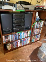 MaxSold Auction: Wooden Media Shelves - Addington Highlands (Ontario, Canada) PARTNER MANAGED Downsizing Online Auction - Highway 41