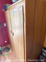MaxSold Auction: Wooden Storage Cabinet with Double Doors - Addington Highlands (Ontario, Canada) PARTNER MANAGED Downsizing Online Auction - Highway 41