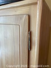 MaxSold Auction: Wooden Storage Cabinet with Double Doors - Addington Highlands (Ontario, Canada) PARTNER MANAGED Downsizing Online Auction - Highway 41