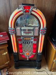 MaxSold Auction: 1950s Style Red & Cream Floor-standing Electric Jukebox - Langley (British Columbia, Canada) SELLER MANAGED Estate Sale Online Auction -  244 Street