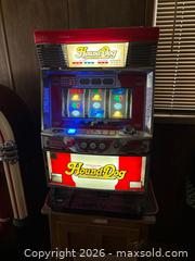MaxSold Auction: Hound Dog Upright Pachislo Slot Machine - Red/White/Chrome - Langley (British Columbia, Canada) SELLER MANAGED Estate Sale Online Auction -  244 Street