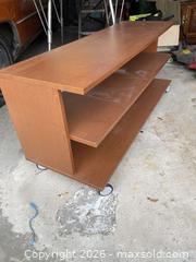 MaxSold Auction: Brown Wood Veneer TV Stand with Open Shelves & Casters - Toronto (Ontario, Canada) SELLER MANAGED Estate Sale Online Auction - Queens Drive