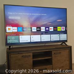 MaxSold Auction: LG 75" 75UP7070PUD 4K UHD LED/LCD TV (TV Stand sold separately) - Phoenix (Arizona, USA) SELLER MANAGED Downsizing Online Auction - West Morningside Drive