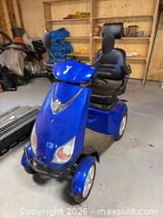 MaxSold Auction: Blue Four-Wheel Mobility Scooter With Digital Display and Accessories - Harcourt (Ontario, Canada) PARTNER MANAGED Downsizing Online Auction - Burleigh Road