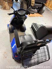 MaxSold Auction: Blue Four-Wheel Mobility Scooter With Digital Display and Accessories - Harcourt (Ontario, Canada) PARTNER MANAGED Downsizing Online Auction - Burleigh Road
