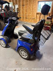 MaxSold Auction: Blue Four-Wheel Mobility Scooter With Digital Display and Accessories - Harcourt (Ontario, Canada) PARTNER MANAGED Downsizing Online Auction - Burleigh Road
