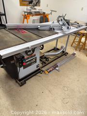 MaxSold Auction: Delta Unisaw 10" Left Tilting Arbor Saw with Accessories and Manual - Harcourt (Ontario, Canada) PARTNER MANAGED Downsizing Online Auction - Burleigh Road