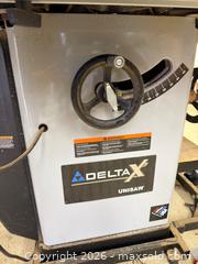 MaxSold Auction: Delta Unisaw 10" Left Tilting Arbor Saw with Accessories and Manual - Harcourt (Ontario, Canada) PARTNER MANAGED Downsizing Online Auction - Burleigh Road