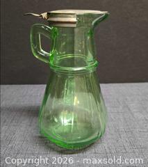 MaxSold Auction: Hazel-Atlas green uranium glass syrup pitcher - Spring (Texas, USA) SELLER MANAGED Charity/Fundraising Online Auction - Danehill Drive
