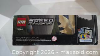 MaxSold Auction: Retired Sealed Lego Champs Porsche Set  - Spring (Texas, USA) SELLER MANAGED Charity/Fundraising Online Auction - Danehill Drive