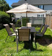 MaxSold Auction: Patio Dining Set with Table, 6 Chairs, Square Tilting Umbrella - Ottawa (Ontario, Canada) PARTNER MANAGED Downsizing Online Auction - Fallowfield Road