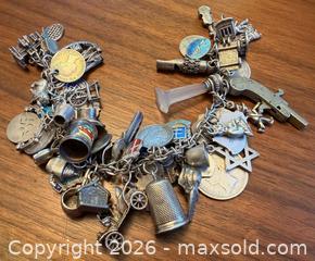 MaxSold Auction: Sterling Silver 7in Charm Bracelet with Travel & Religious Charms - Ottawa (Ontario, Canada) PARTNER MANAGED Downsizing Online Auction - Fallowfield Road