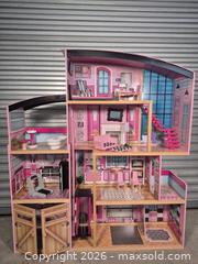 MaxSold Auction: KidKraft Multi-Level Wooden Dollhouse in Pink, White & Natural - Cypress (Texas, USA) PARTNER MANAGED Downsizing Online Auction - Woodworth Drive