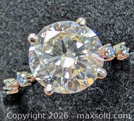 MaxSold Auction: 10k(2.3g), lab diamond (3ct), lab diamond (0.06ct)ring, size 6.5 - Toronto (Ontario, Canada) PARTNER MANAGED Downsizing Online Auction - Yonge Street