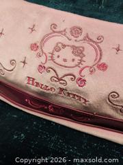 MaxSold Auction: Hello, Kitty, fuzzy hobo bag purse. - Fairfield (California, USA) SELLER MANAGED Downsizing Online Auction - Dobe Lane (STORAGE)