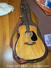 MaxSold Auction: Yamaha Guitar A - Kingston (Ontario, Canada) SELLER MANAGED Downsizing Online Auction - Rankin Crescent