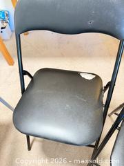 MaxSold Auction: Black Metal Folding Chairs with Padded Vinyl Seats (Set of 2) stuck paper on seat and hole - Vancouver (British Columbia, Canada) SELLER MANAGED Estate Sale Online Auction - West King Edward Avenue (CONDO)