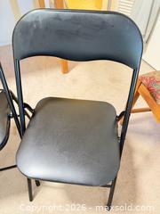 MaxSold Auction: Black Metal Folding Chairs with Padded Vinyl Seats (Set of 2) stuck paper on seat and hole - Vancouver (British Columbia, Canada) SELLER MANAGED Estate Sale Online Auction - West King Edward Avenue (CONDO)