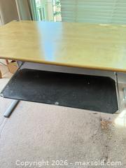 MaxSold Auction: Large Laminate work Desk with Metal Frame and Keyboard Tray 28x55x27” height - Vancouver (British Columbia, Canada) SELLER MANAGED Estate Sale Online Auction - West King Edward Avenue (CONDO)