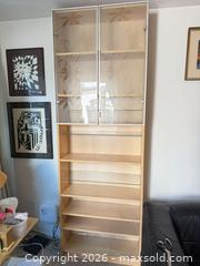 MaxSold Auction: Light Maple/Birch Display Cabinet with Glass Doors Maybe Billy IKEA 31x11x100 aprox - Vancouver (British Columbia, Canada) SELLER MANAGED Estate Sale Online Auction - West King Edward Avenue (CONDO)