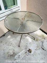 MaxSold Auction: Round Glass Top Patio Table, Metal Frame, 34" Dia - Vancouver (British Columbia, Canada) SELLER MANAGED Estate Sale Online Auction - West King Edward Avenue (CONDO)