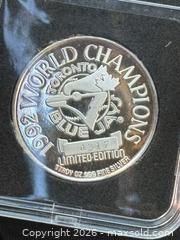 MaxSold Auction: Rare- 1992 TORONTO BLUE JAYS WORLD CHAMPIONS ONE OUNCE SILVER COIN - Aurora (Ontario, Canada) SELLER MANAGED Estate Sale Online Auction - Closs Square