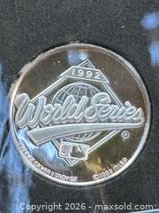 MaxSold Auction: Rare- 1992 TORONTO BLUE JAYS WORLD CHAMPIONS ONE OUNCE SILVER COIN - Aurora (Ontario, Canada) SELLER MANAGED Estate Sale Online Auction - Closs Square