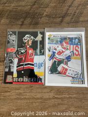 MaxSold Auction: 2 Martin Brodeur Cards - Ottawa (Ontario, Canada) SELLER MANAGED Reseller Online Auction - Canadian Shield Avenue (CONDO)