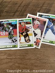 MaxSold Auction: 4 OppeeChee 1991 Rookie and 1 Ian Hejda Young Guns card - Ottawa (Ontario, Canada) SELLER MANAGED Reseller Online Auction - Canadian Shield Avenue (CONDO)