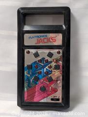 MaxSold Auction: Jacks Hand Held Game Collectible  - Kingston (Ontario, Canada) SELLER MANAGED Reseller Online Auction - Railway Street