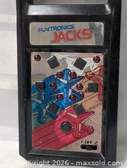 MaxSold Auction: Jacks Hand Held Game Collectible  - Kingston (Ontario, Canada) SELLER MANAGED Reseller Online Auction - Railway Street