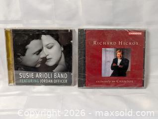 MaxSold Auction: Pair of CDs music - Kingston (Ontario, Canada) SELLER MANAGED Reseller Online Auction - Railway Street