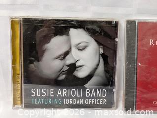 MaxSold Auction: Pair of CDs music - Kingston (Ontario, Canada) SELLER MANAGED Reseller Online Auction - Railway Street