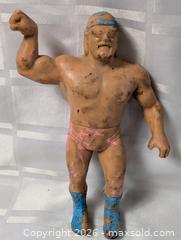 MaxSold Auction: Worn beat up Wrestler Rubber Figure  - Kingston (Ontario, Canada) SELLER MANAGED Reseller Online Auction - Railway Street