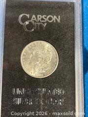 MaxSold Auction: 1883 Morgan Uncirculated USA SILVER DOLLAR with C.O.A. - Toronto (Ontario, Canada) SELLER MANAGED Reseller Online Auction - Chesswood Drive