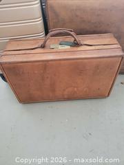 MaxSold Auction: Rolling Hardshell Spinner Suitcase & Leather Briefcase Set - Winter Haven (Florida, USA) PARTNER MANAGED Estate Sale Online Auction - Jardin Lane