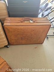 MaxSold Auction: Rolling Hardshell Spinner Suitcase & Leather Briefcase Set - Winter Haven (Florida, USA) PARTNER MANAGED Estate Sale Online Auction - Jardin Lane