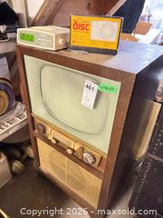 MaxSold Auction: Admiral 1950s Console TV Wood Cabinet with Clock Radio and Camera D - Toronto (Ontario, Canada) Estate Sale Online Auction - Sparkhall Avenue