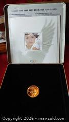 MaxSold Auction: Canada $2 Polar Bear Coin & Stamp Set (2004) and The Millennium Coin and Stamp Set B - Toronto (Ontario, Canada) Estate Sale Online Auction - Sparkhall Avenue