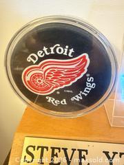 MaxSold Auction: Detroit Red Wings Steve Yzerman Hockey Puck Display B - Toronto (Ontario, Canada) Estate Sale Online Auction - Sparkhall Avenue