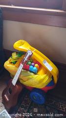 MaxSold Auction: Mixed Children's Toys Lot with Wooden Ukulele & Ride-On B - Toronto (Ontario, Canada) Estate Sale Online Auction - Sparkhall Avenue