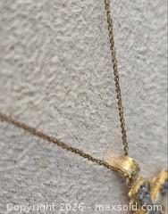 MaxSold Auction: 10k gold chain & 10k pendant - Port Moody (British Columbia, Canada) SELLER MANAGED Downsizing Online Auction - St Johns Street (CONDO)