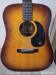 MaxSold Auction: Epiphone Sunburst Dreadnought Acoustic Guitar in case - Toronto (Ontario, Canada) PARTNER MANAGED Reseller Online Auction - Queen Street West