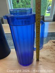 MaxSold Auction: Tupperware Blue Acrylic Pitcher, Navy blue Insulated Carafe & Red vinyl Lunch Cooler Bag - Saanich (British Columbia, Canada) SELLER MANAGED Downsizing Online Auction - Sunnygrove Place