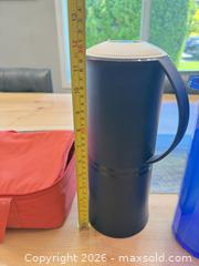MaxSold Auction: Tupperware Blue Acrylic Pitcher, Navy blue Insulated Carafe & Red vinyl Lunch Cooler Bag - Saanich (British Columbia, Canada) SELLER MANAGED Downsizing Online Auction - Sunnygrove Place
