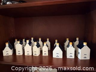 MaxSold Auction: Collectible set of KLM Delft Blue canal house miniature bottles, modeled after historic Dutch canal houses.  - Vancouver (British Columbia, Canada) SELLER MANAGED Moving Online Auction - West 11th Avenue