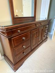 MaxSold Auction: Large Cherry Finish Dresser with Matching Mirror and Glass Protector - Vancouver (British Columbia, Canada) SELLER MANAGED Moving Online Auction - West 11th Avenue