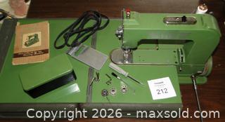 MaxSold Auction: Vintage Elna “Grasshopper” Portable Sewing Machine with Case, Manual and Accessories  - Delta (British Columbia, Canada) SELLER MANAGED Downsizing Online Auction - Norum Place